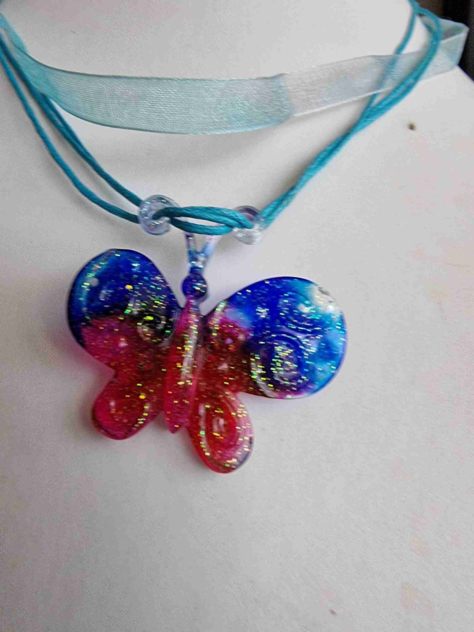 pink and blue glittery butterfly necklace - Image 3