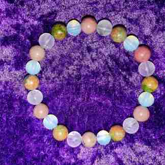 Crystal beaded bracelet for healing and meditation.. Rose Quartz...Unakite... Opalite... Rhodonite