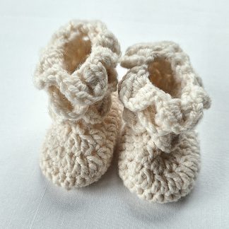 Crocheted baby bootees