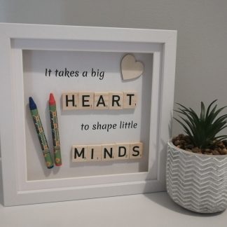 It takes a big heart to shape little minds frame