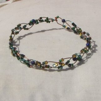 Copper and vivid green coloured copper plaited bracelet with lapis lazuli and a mixture of beads 183