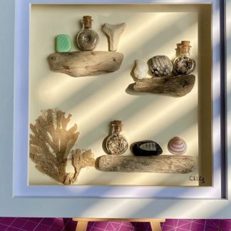 Beachcombed finds framed picture.
