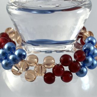 23 Ruby red, blue, bronze glass bead bracelet